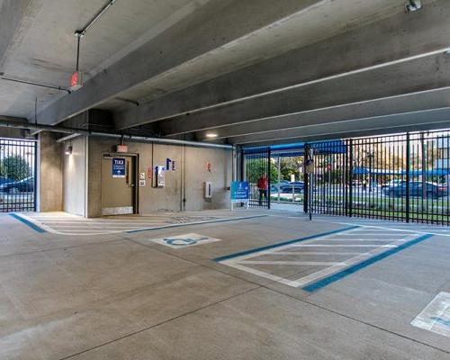 Photo of handicap parking spaces on the ground level of the parking structure